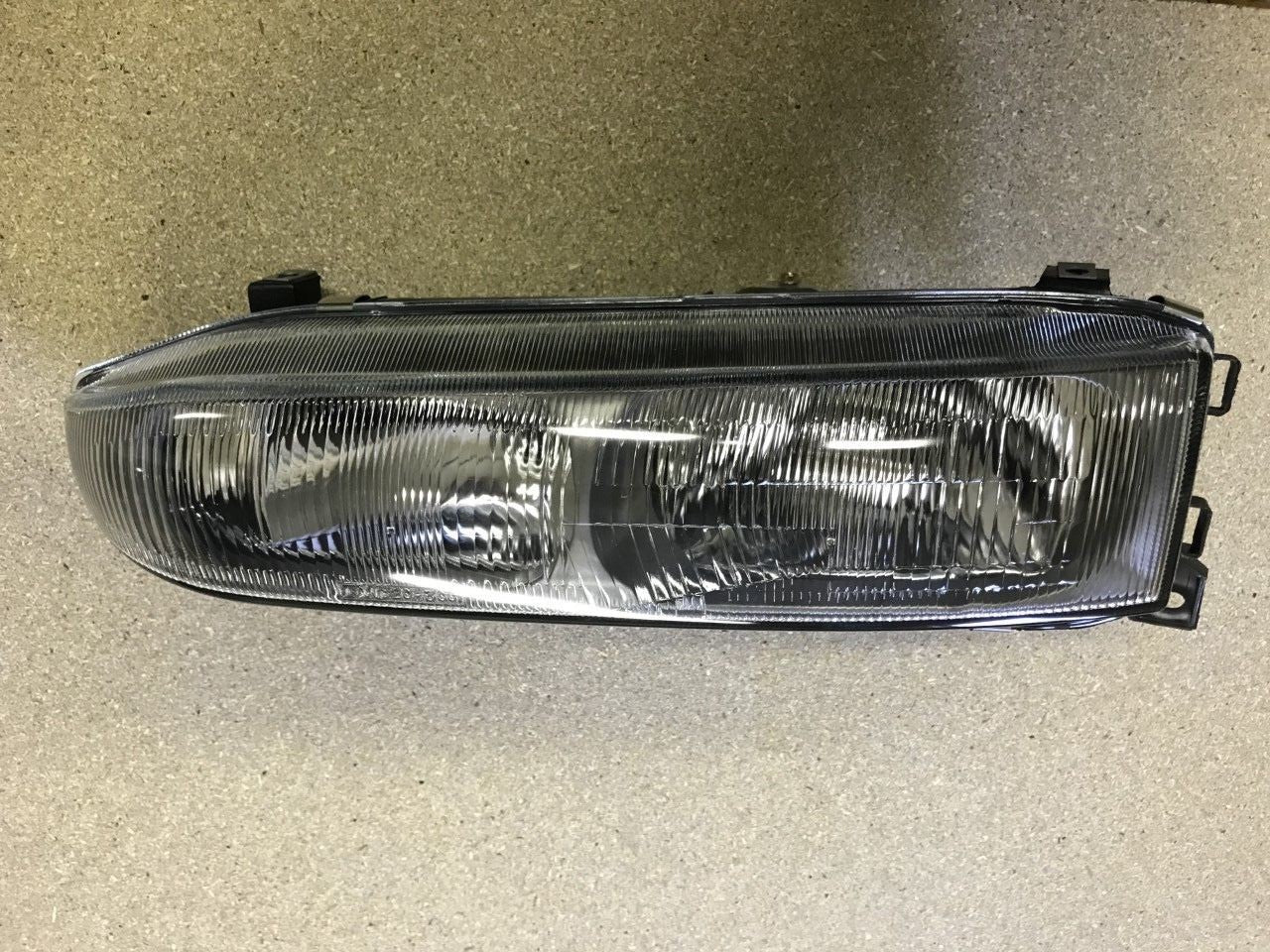 Headlight Lamp Near Side Left Hand Mitsubishi Galant 1993-96 TYC 20-3001-05-6B